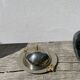 Silver-plated metal butter dish with knots