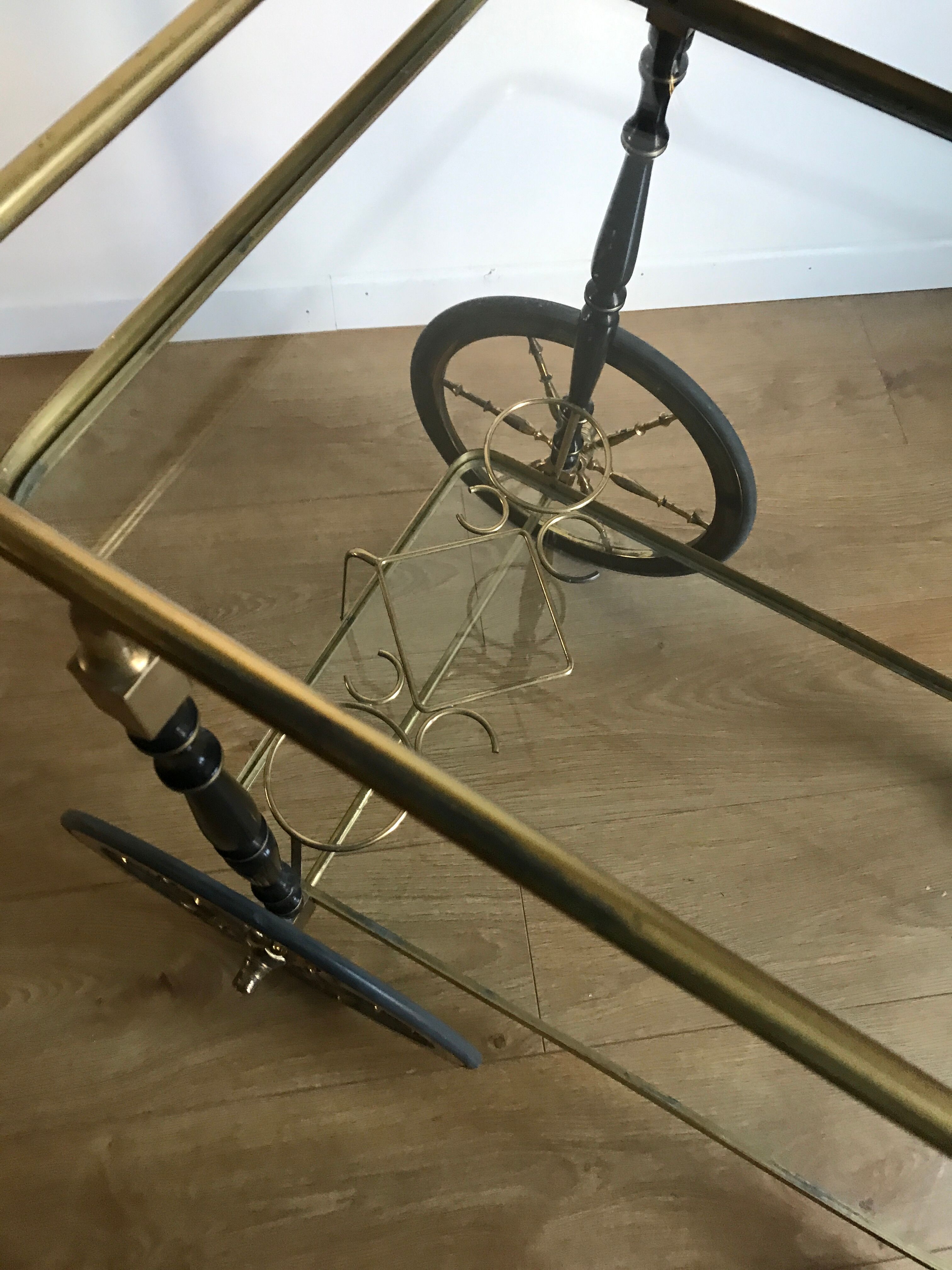 Vintage rolling golden and black dessert in brass and glass