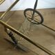 Vintage rolling golden and black dessert in brass and glass