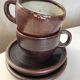 Pair of stoneware breakfast cups signed 1970
