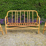 Vintage living room sofa and 2 rattan armchairs.