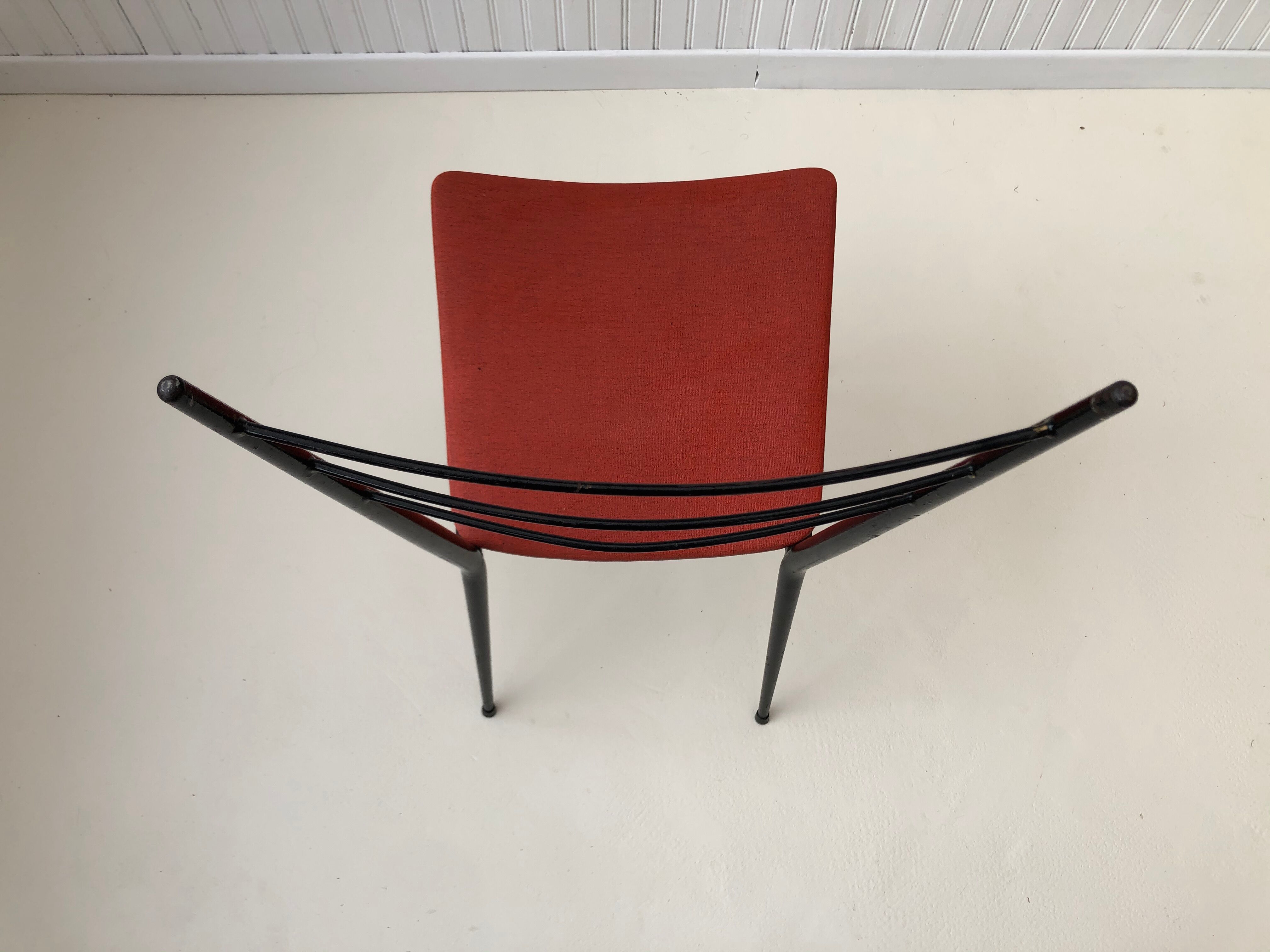 Red metal chairs from the 60s