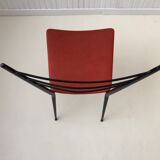 Red metal chairs from the 60s