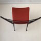 Red metal chairs from the 60s