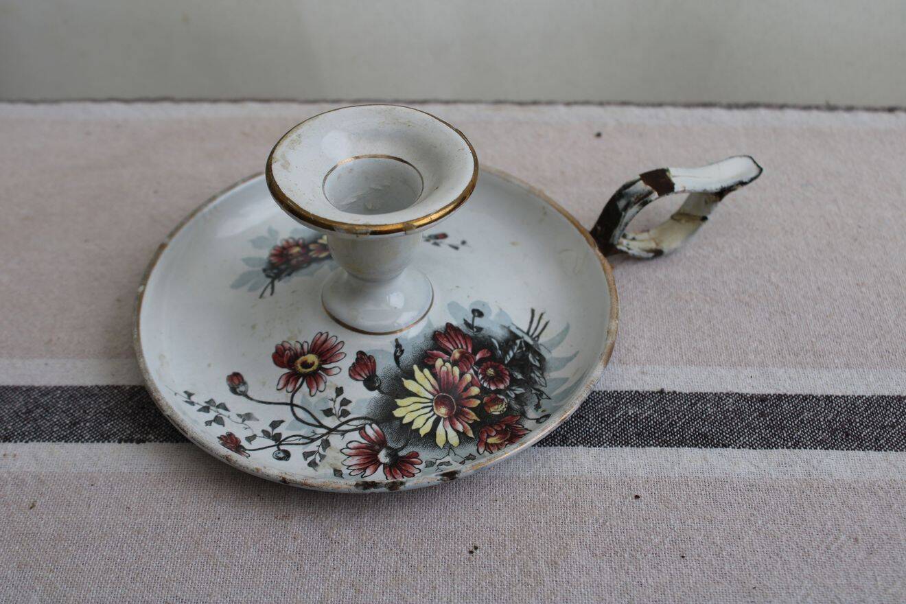 Antique enamel candle holder