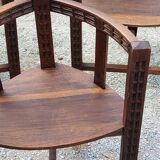 Set of three brutalist tripod armchairs in carved solid oak