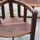 Set of three brutalist tripod armchairs in carved solid oak