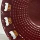 Burgundy and gold openwork plate in ceramic from Saint-Clement, 1950s.