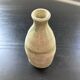 Single-flower vase with shell decoration