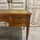 Louis XVI style flat desk in cherry wood from around 1960.