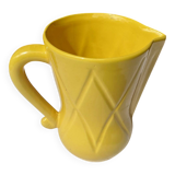 Vintage lemon yellow ceramic pitcher.