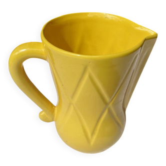 Vintage lemon yellow ceramic pitcher.
