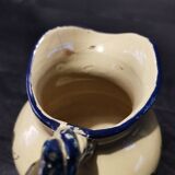 Small old pitcher