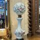 Napoleon III lamp in white opaline and painted with floral decoration - late 19th century