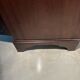 Antique mahogany secretary, upholstered flap and interior storage