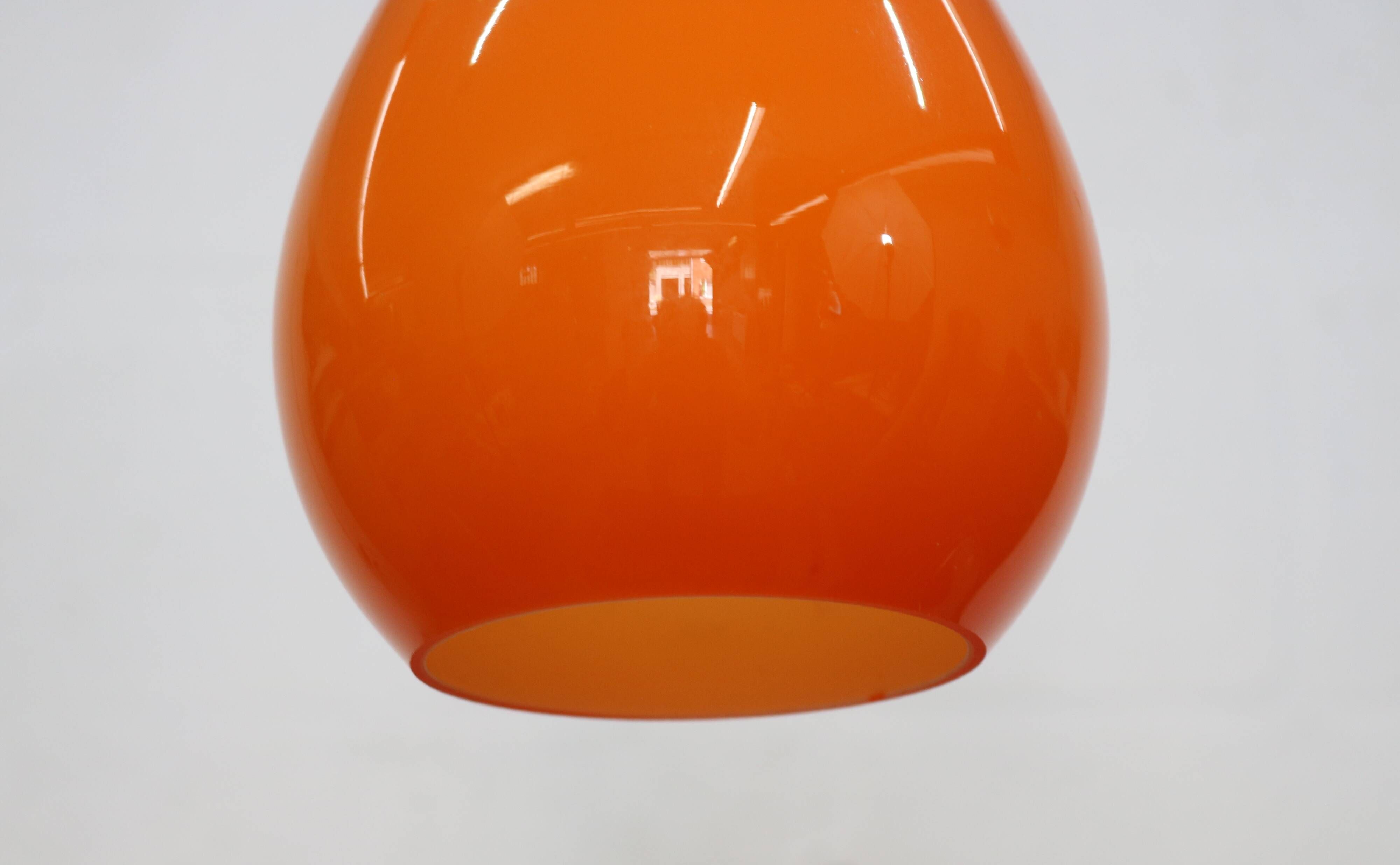 Orange teardrop glass pendant lamp made by Holmegaard - Denmark 1960