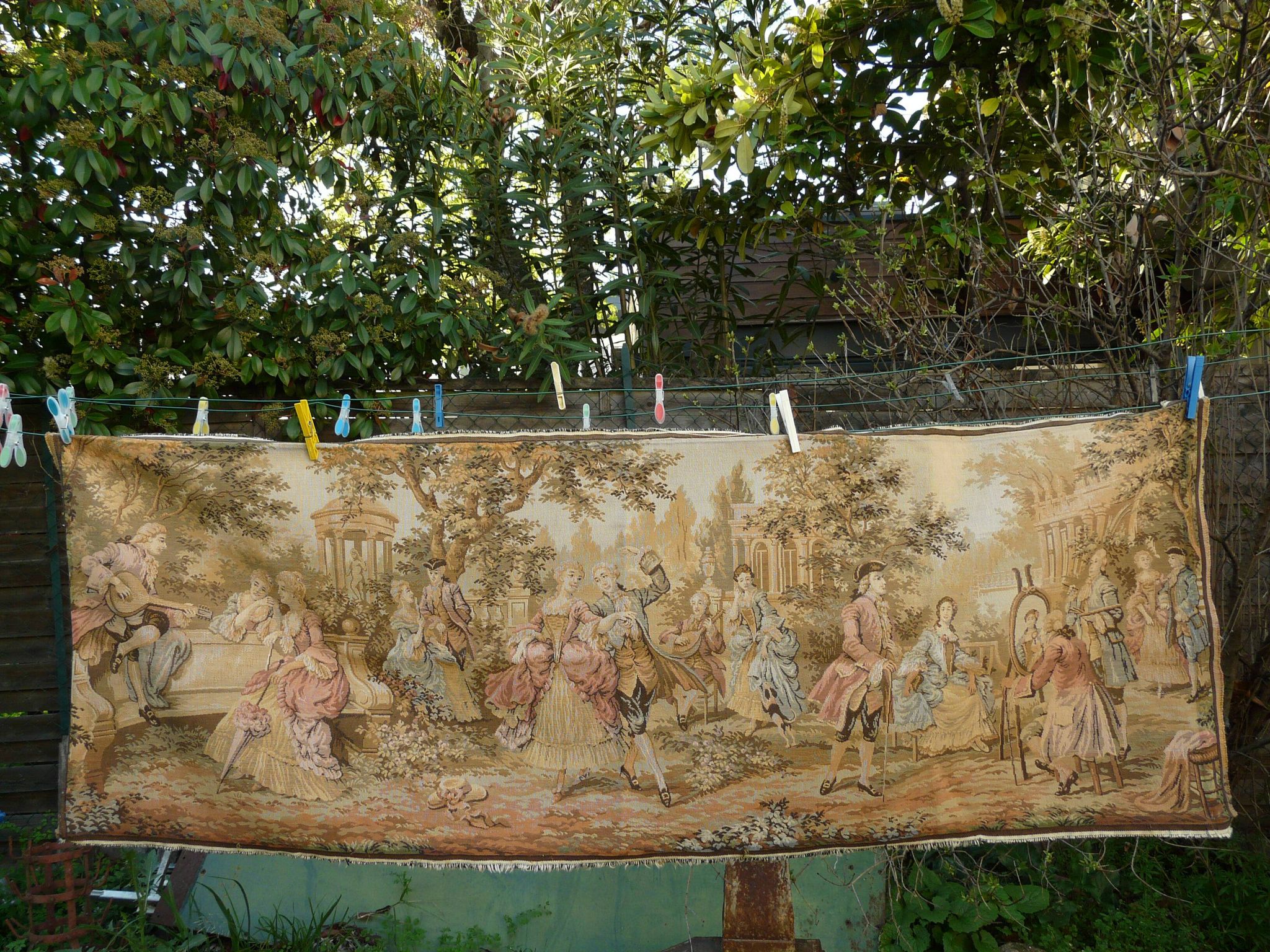 Tapestry wall hanging depicting a gallant scene from the mid-century.