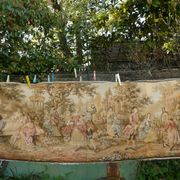 Tapestry wall hanging depicting a gallant scene from the mid-century.