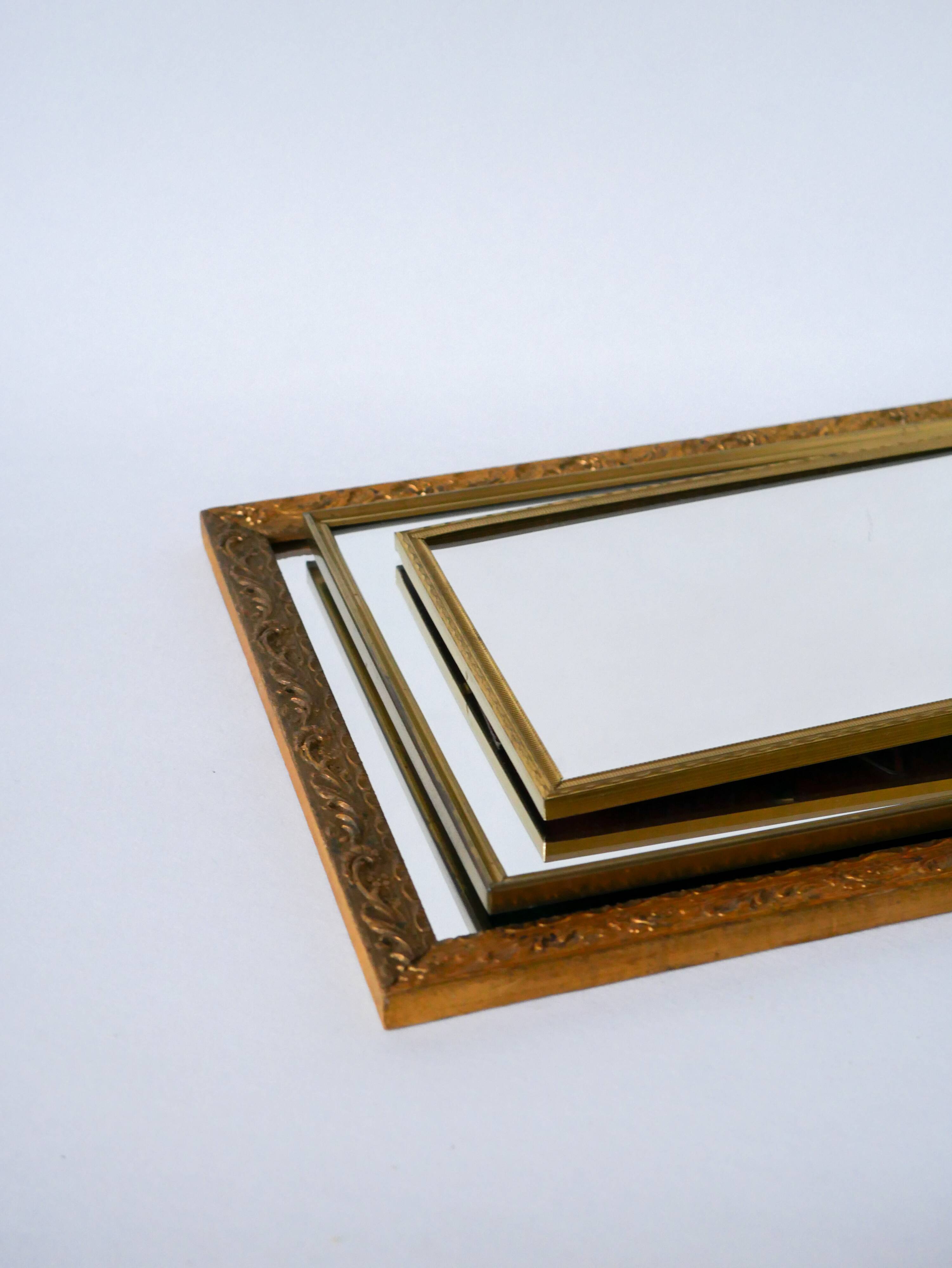 20th century wooden and gilded stucco mirror