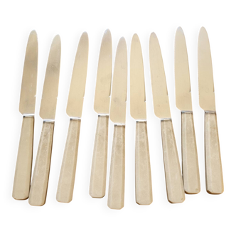 9 knives with bakelite handles, stainless steel, 1950