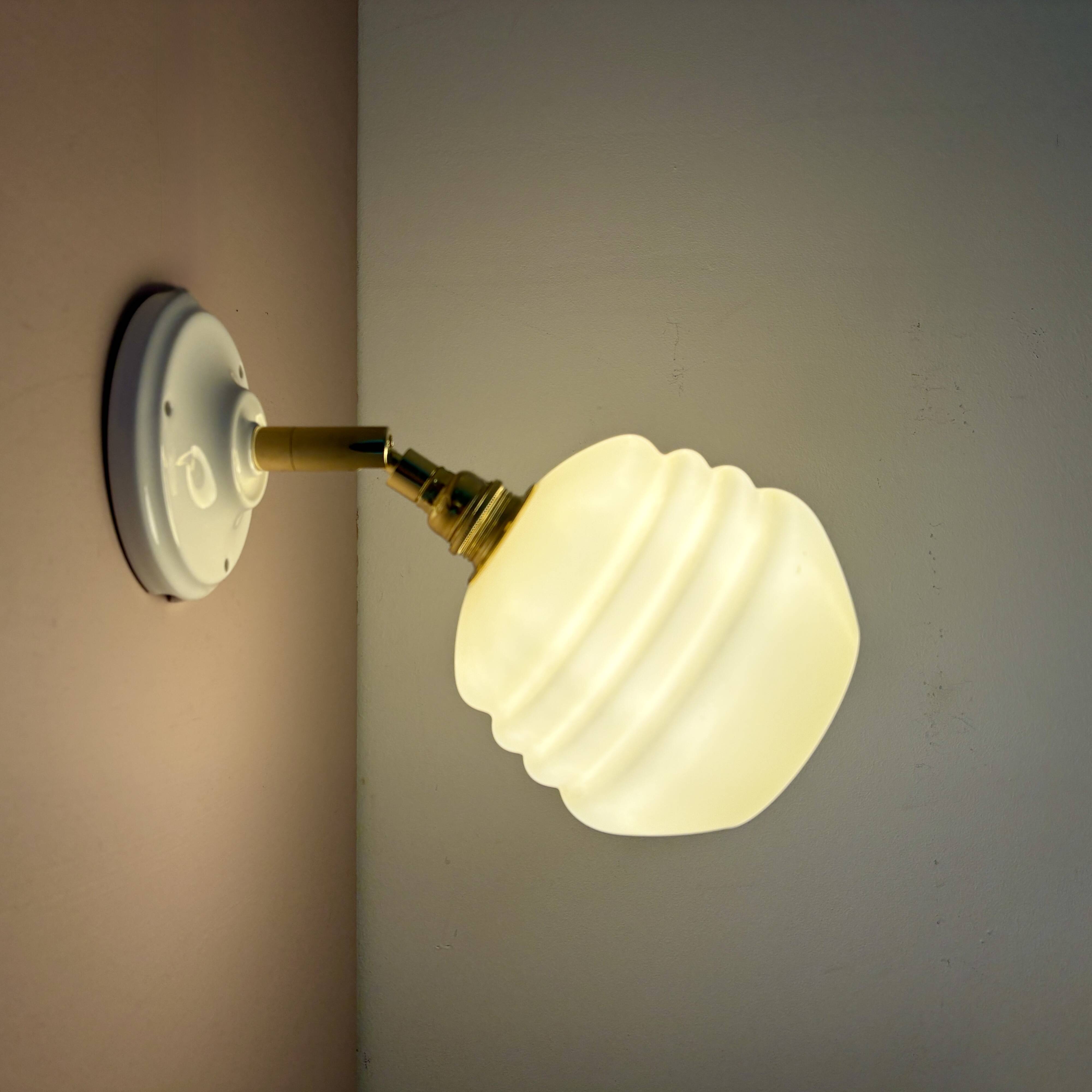 Vintage globe wall lamp in pale yellow opaline