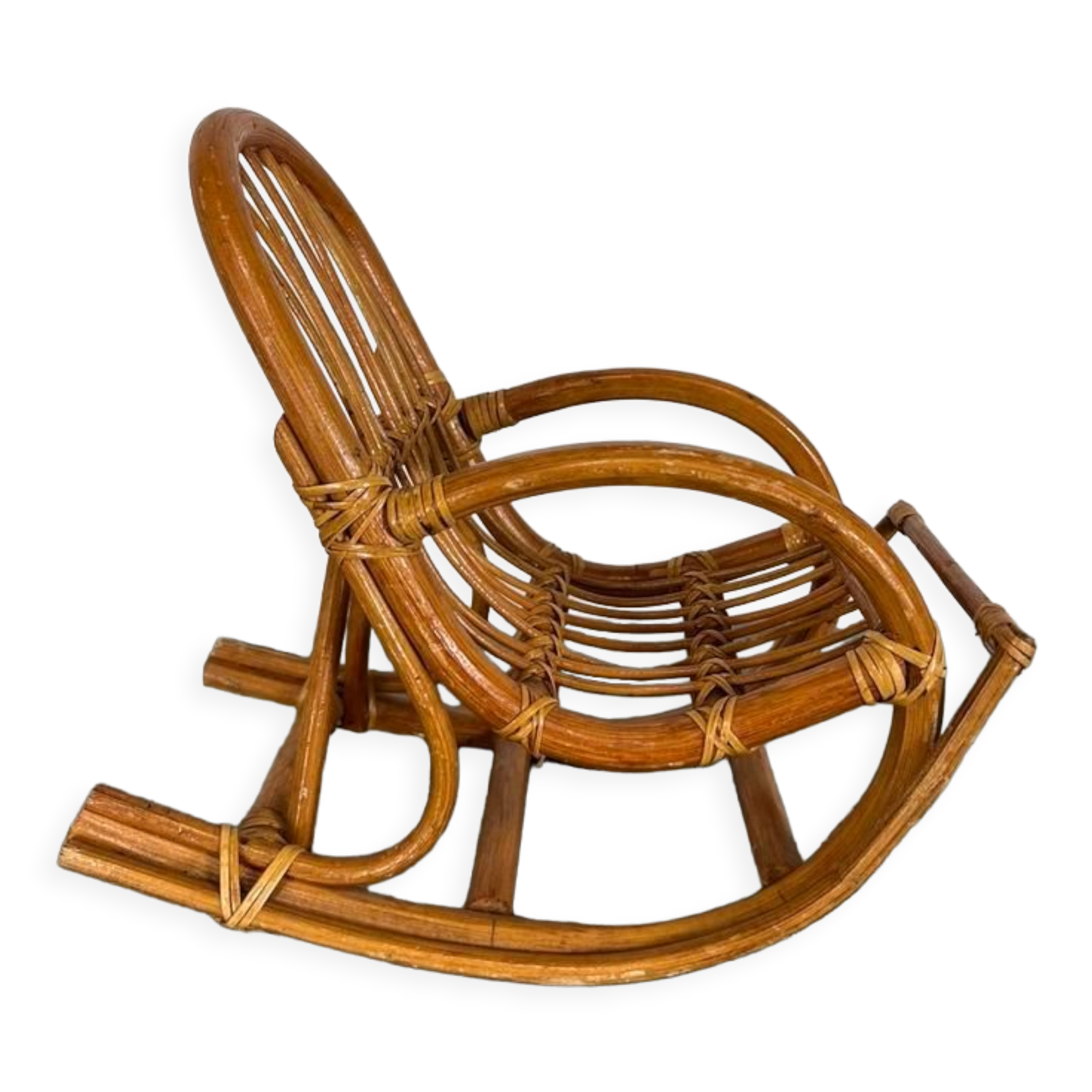 Vintage doll rocking chair in rattan