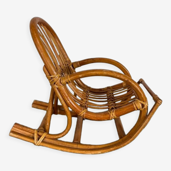 Vintage doll rocking chair in rattan