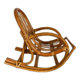 Vintage doll rocking chair in rattan