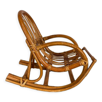Vintage doll rocking chair in rattan