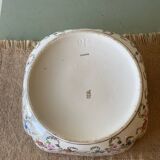 Old hollow porcelain dish with floral decoration and gold trim