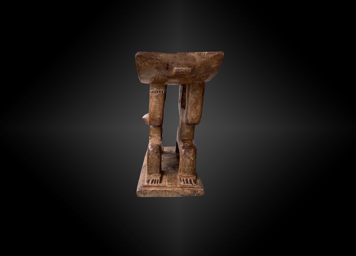 Seat featuring a caryatid couple ashanti culture, ghana