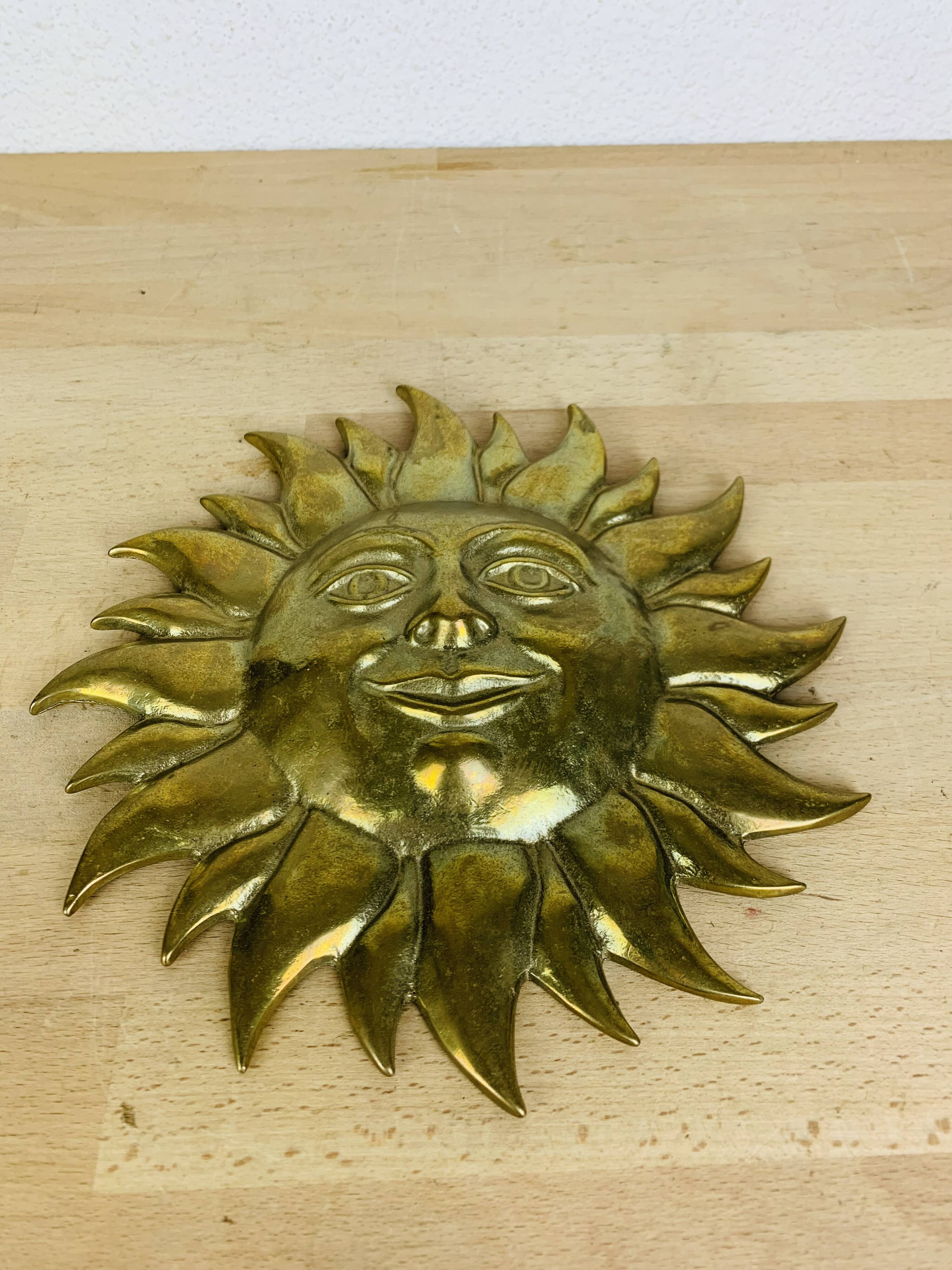 Vintage solid brass sun wall sculpture
