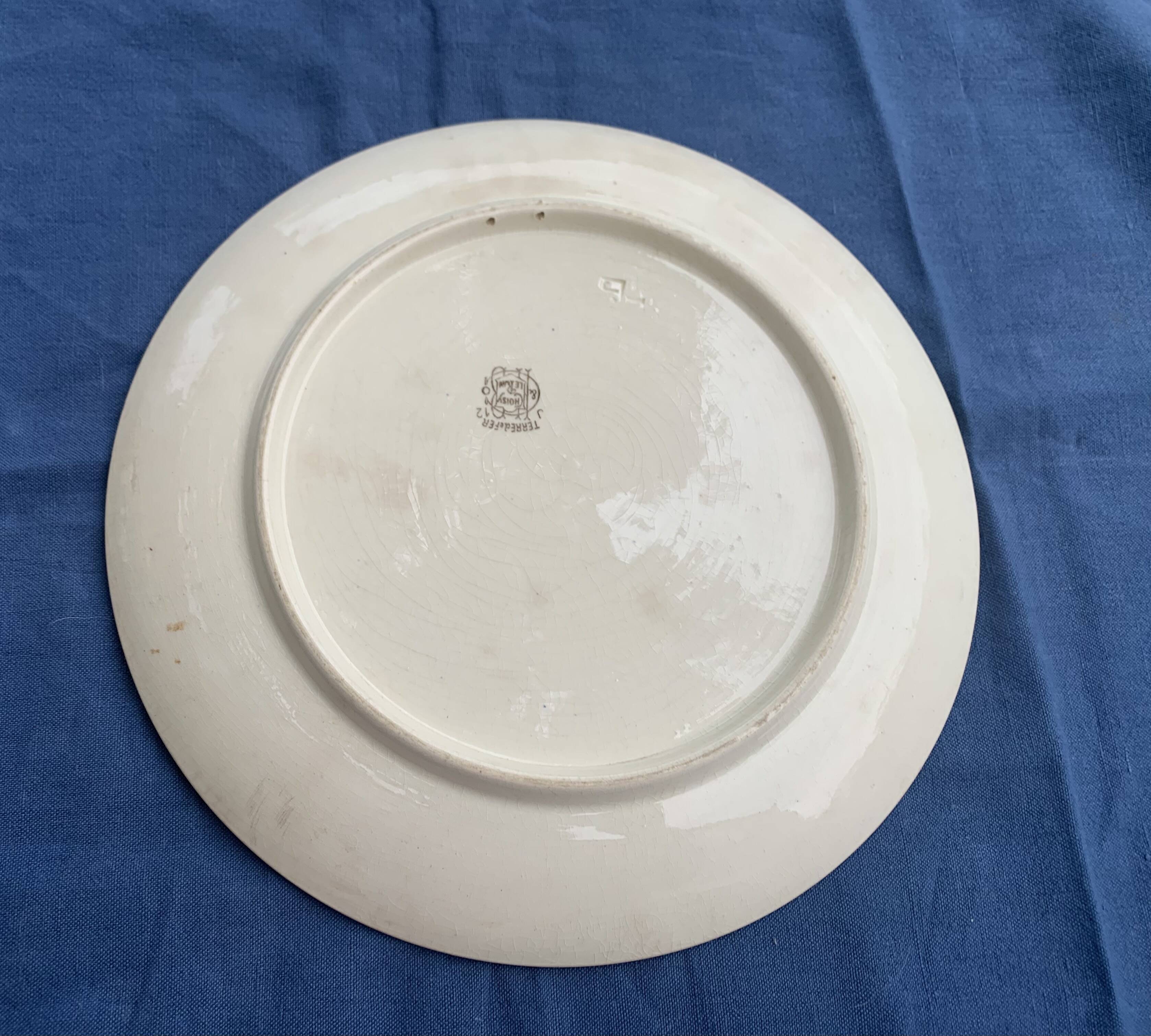 Plate with iron rose motifs, hb, Choisy le roi art deco