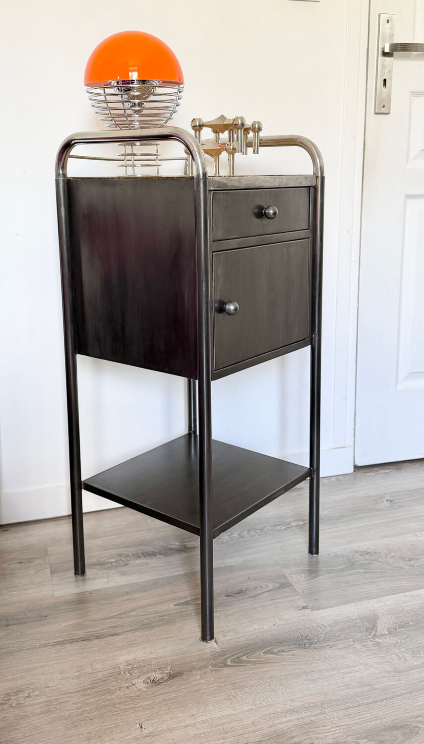 Vintage bedside table in brushed metal