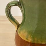 Green and brown ceramic pitcher