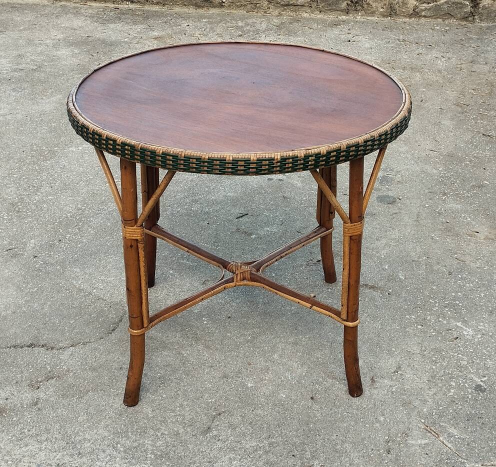 Round wood and rattan table
