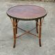 Round wood and rattan table