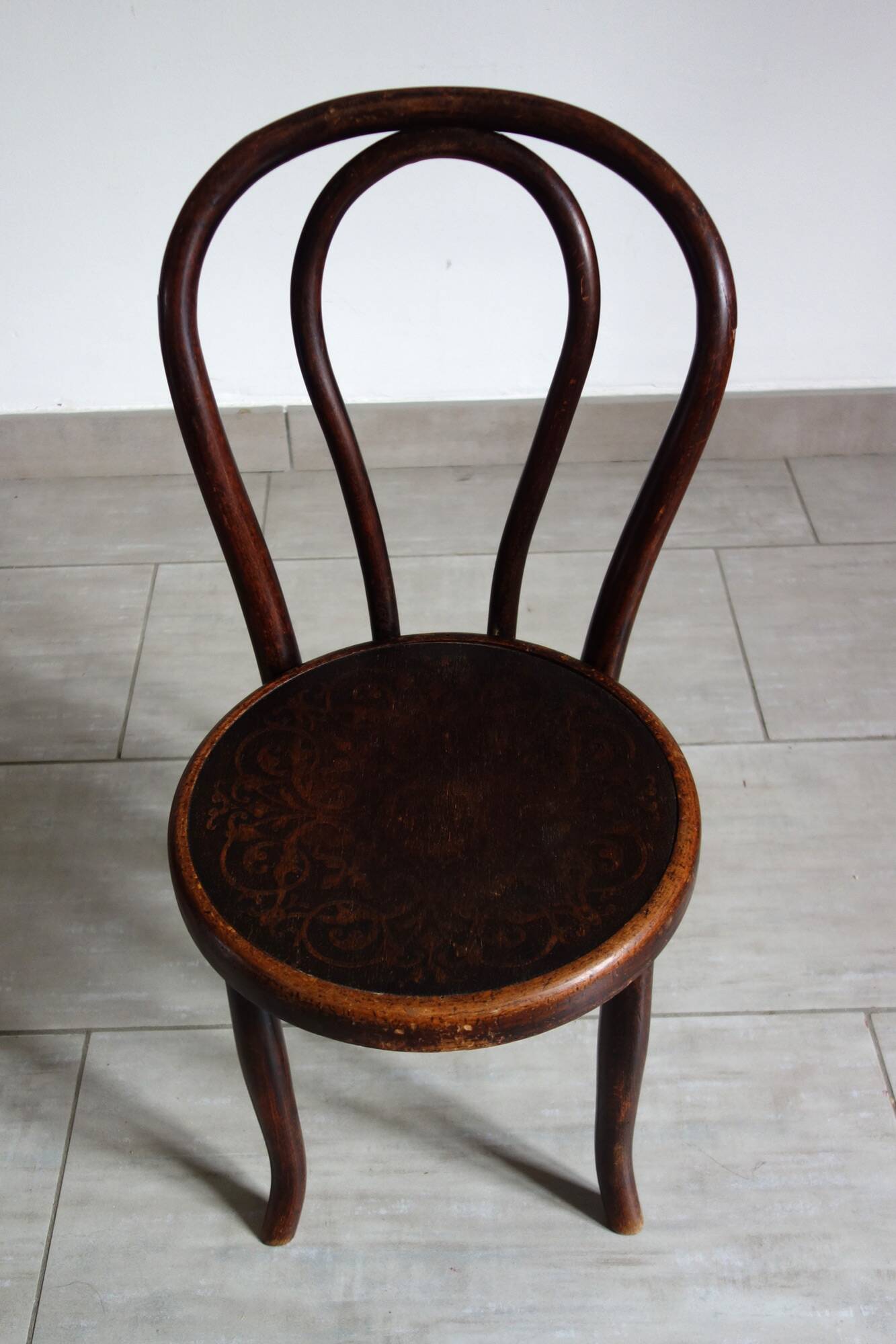 Antique curved wooden children's chair by Fischel, early 20th century.