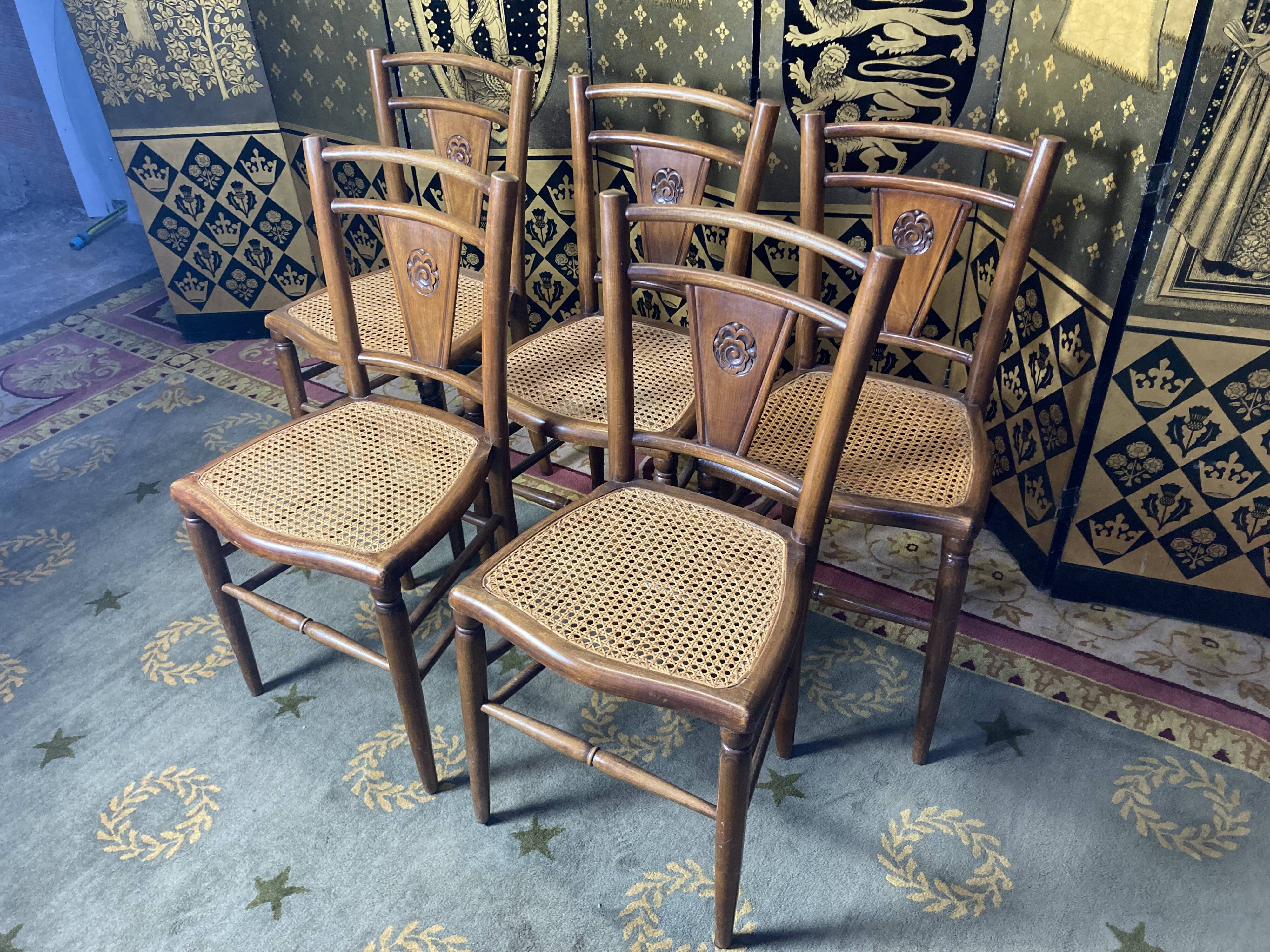 5 tanned bistro chairs