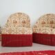 Beige toad armchair with floral patterns and red fringes