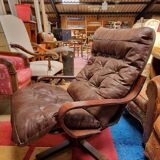 Scandinavian tilting and rotating armchair
