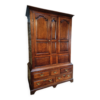 Antique English oak wardrobe with drawers, England, circa 1800–1820.