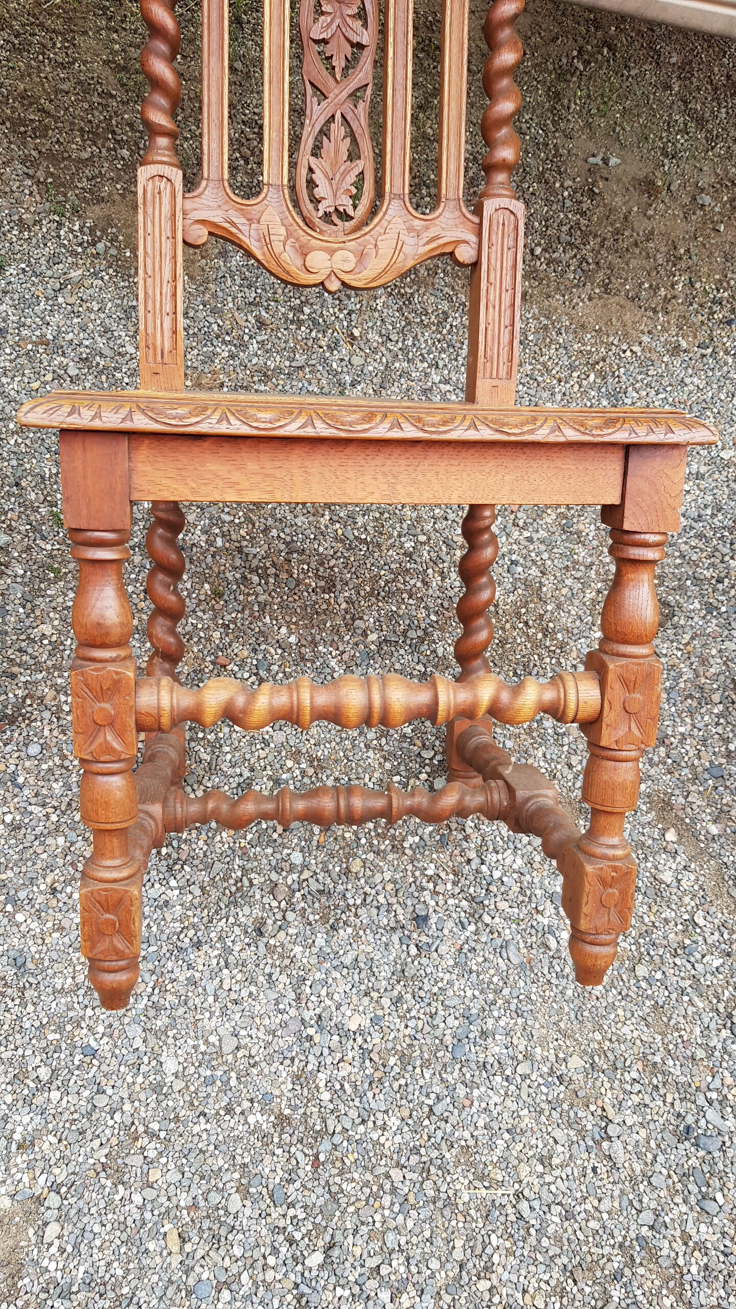 Carved antique chairs with rattan seat