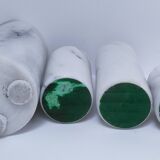 Four white marble candlesticks with black veins, 70s design