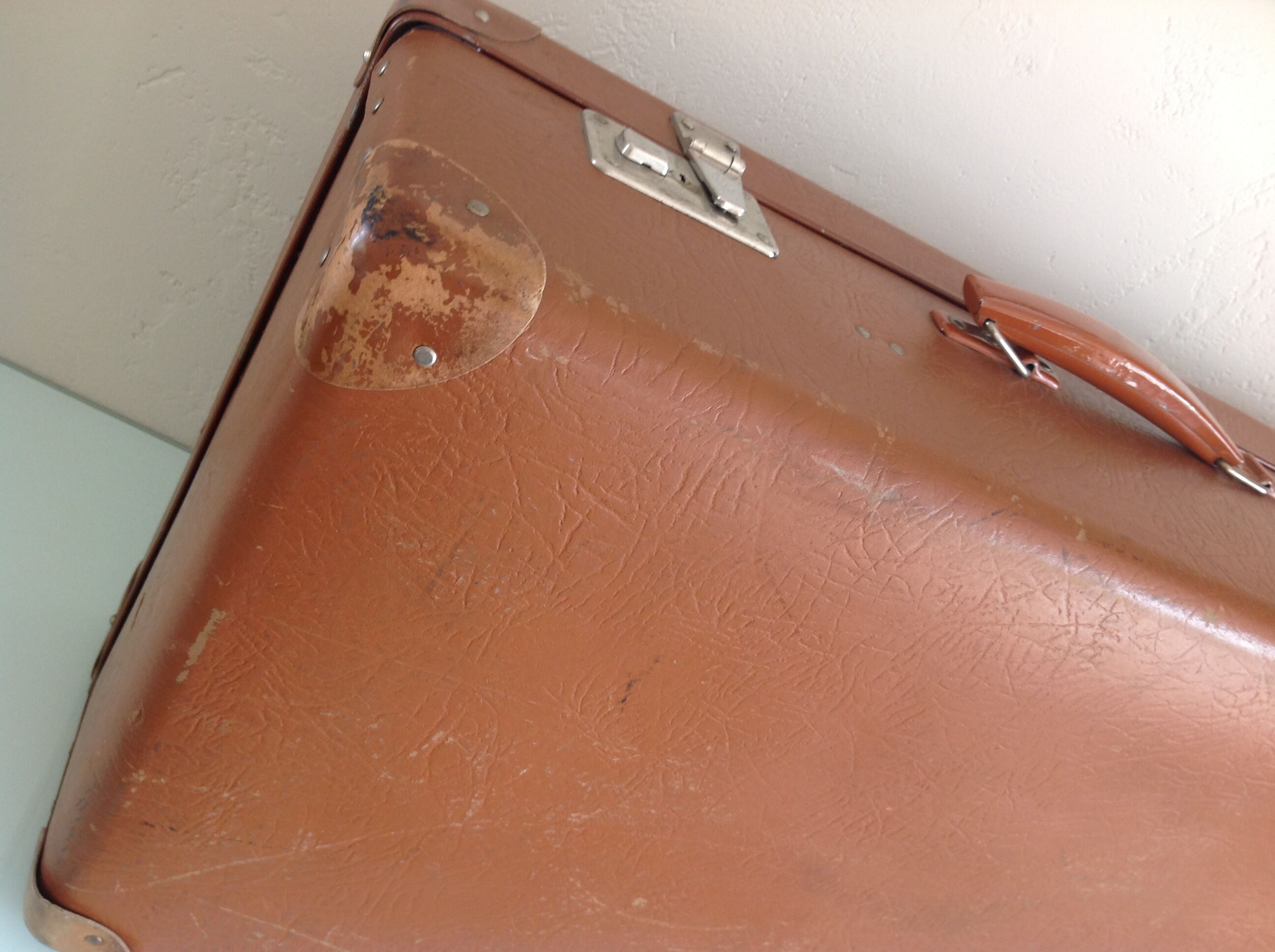 Light brown vintage suitcase