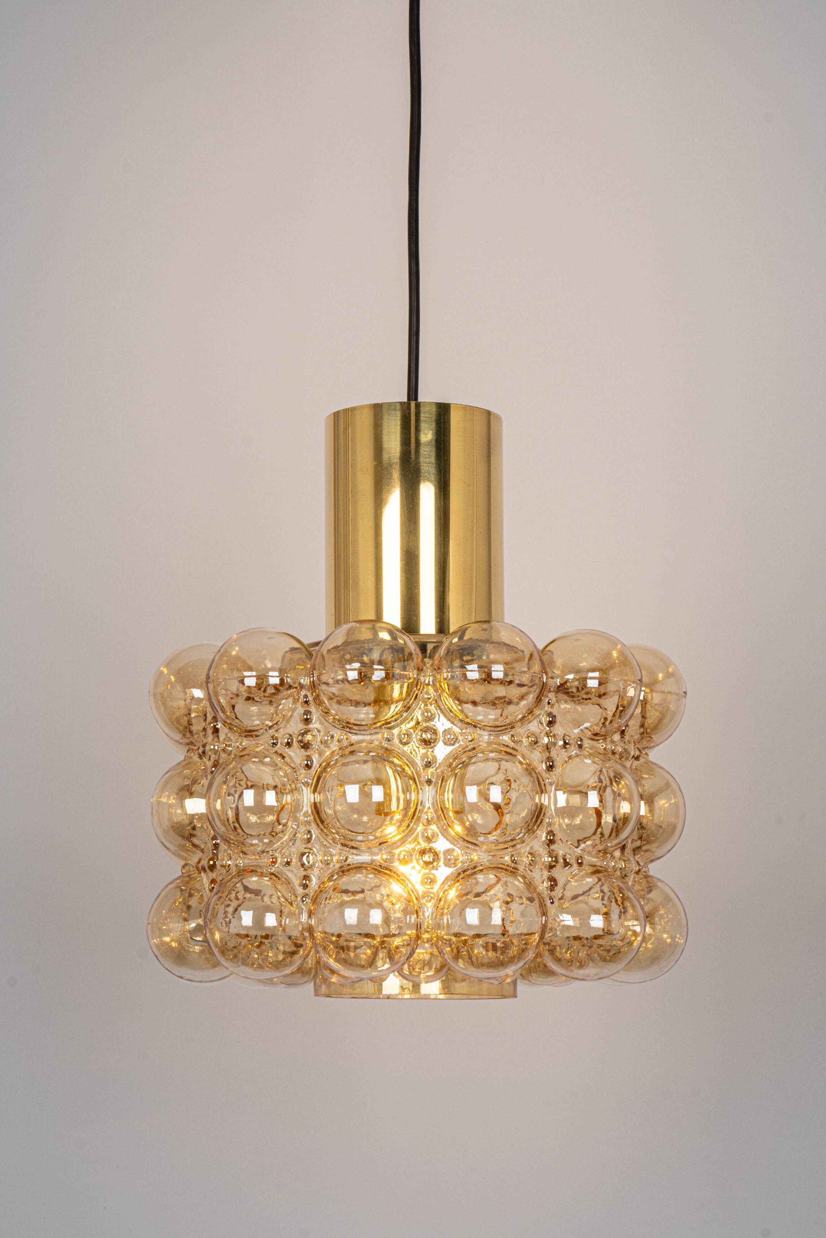 Large amber bubble glass pendant by Helena Tynell for Limburg, Germany, 1970s.