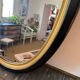 Miroir vintage ovale bois noir et doré