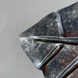 Silver metal leaf pocket emptier
