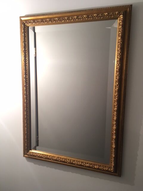 Bevelled mirror with gold frame 49x68cm