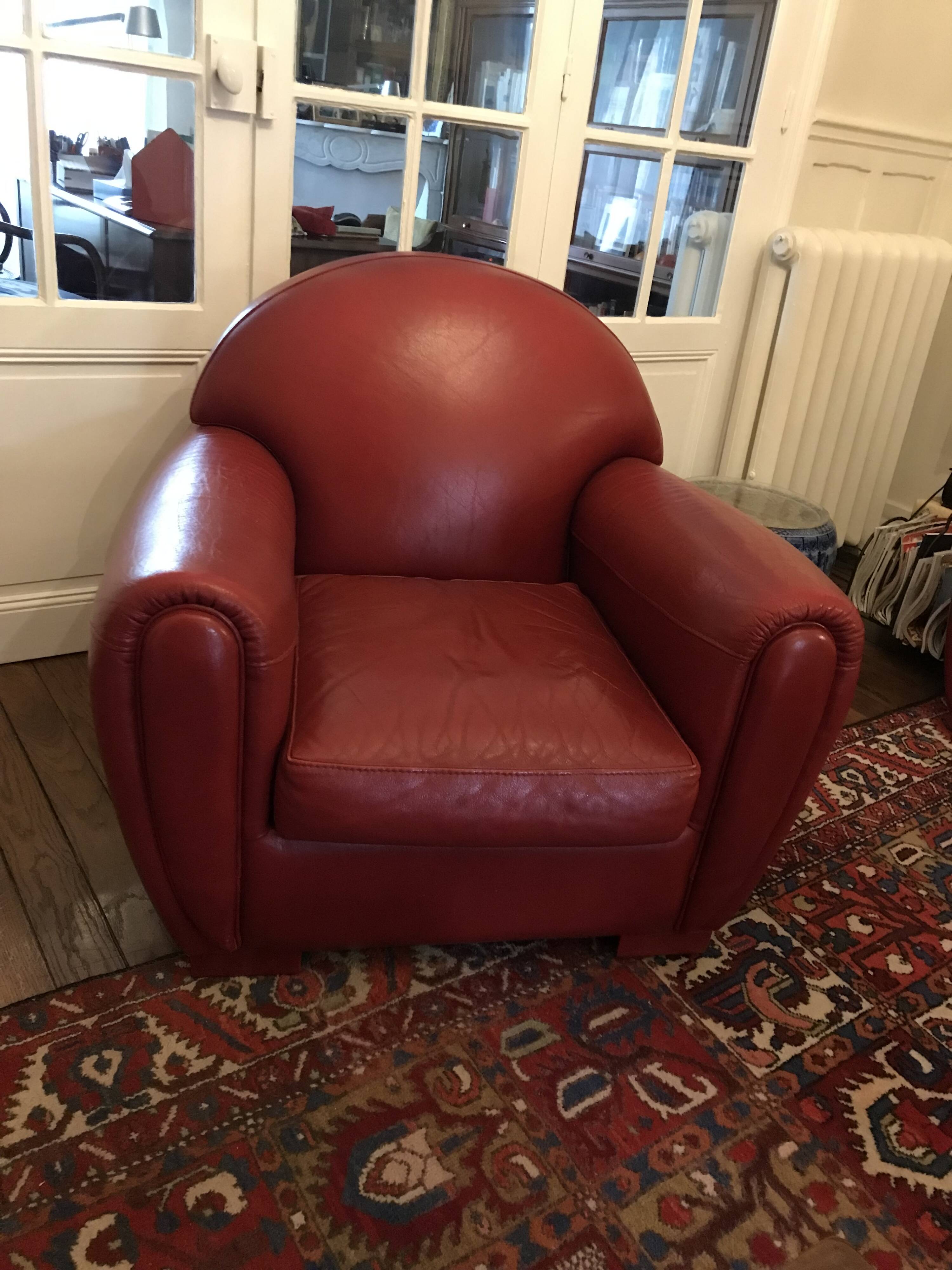 Red leather club armchair